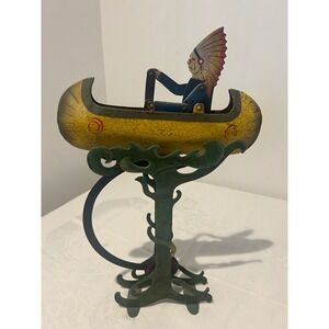 Vintage Tin Toy Native American Man in Canoe Perpetual Motion